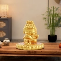 Golden baby Buddha statue holding a fish on a lotus base for desk decoration - Golden Koi Buddha (1081-17)