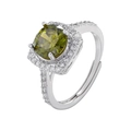 Macro detail of silver ring with round olive green gemstone and pavé halo setting - Platinum Olive Green Zirconia
