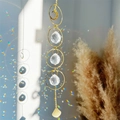 Macro shot of gold moon crystal wind chime showing rainbow refraction and faceted beads - Gold Moon Star Style (02)