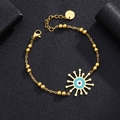 Macro shot of stainless steel evil eye bracelet with sunburst pendant and lobster clasp - Style 7 (Blue Sunburst)
