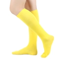 Vibrant yellow knee-high socks for women featuring ribbed cuffs and elastic cotton blend - One Size / Yellow