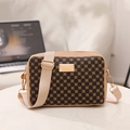 Dark brown textured crossbody bag with beige strap and gold metallic accent plate - Khaki