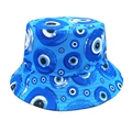 Detailed view of bucket hat featuring embroidered evil eye patterns on blue canvas fabric - M (56-58cm) / Blue