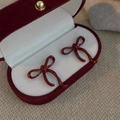 Classic wine red bow earrings in a premium velvet gift box on a soft beige background - Dark Red Bow (Silver Pin)