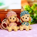 Pink and blue rhinestone puppy keychains with golden metal finish for bags and keys - Poodle Pair