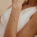 Elegant 18K gold plated stainless steel thin chain bracelet with a single freshwater pearl - Pearl Bracelet