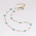 Detail of gold chain necklace with turquoise beads, white pearls and extension chain - Irregular Turquoise Pearl Necklace
