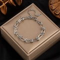 Hip hop punk style silver stainless steel knot chain bracelet on luxury black velvet display - Silver Bracelet