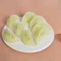 Miniature pale green and white steamed dumpling models on a white plate - 6cm Vegetable Filling Dumpling (No Buckle)