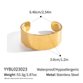 Detailed view of wide textured cuff bracelet with size dimensions and gold finish - Wave Embossed Gold Style (YYBL023023)