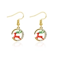 Golden Christmas earrings with reindeer enamel pendant and rhinestones on white background - Rhinestone Border Reindeer