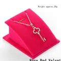 Silver key pendant necklace with crystals on a rose red velvet jewelry display stand - Single Pendant Stand Rose Red