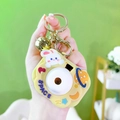 Yellow camera whack-a-mole game keychain with rabbit patterns and a gold bell - Little Rabbit Projector Camera - Yellow