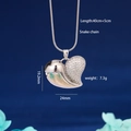 Collana a cuore con catena snake, finitura lucida e pavé di zirconi bianchi eleganti - Cuore diviso in zirconia lucida d'argento