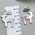 Christmas reindeer metal charm with white enamel detail and silver plating for DIY jewelry - Christmas Reindeer 23x18mm