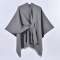 Detailed view of gray cashmere-like shawl featuring lace-up knot and fringe tassels - Solid Color Tassel Tie / Gray