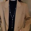 Detail of elegant gold Y-shaped necklace featuring white pearls on a long chain - 4# Necklace-Silver
