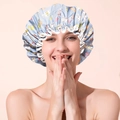 Detail of light blue waterproof shower cap with cute rabbit pattern and elastic band - Little Rabbit