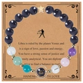 Handmade Libra zodiac bracelet with blue sandstone beads and gold charm on a vintage card - Libra