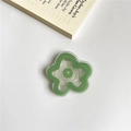 Green flower-shaped collapsible phone grip with clear base for mobile device - Green