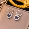 Silver hoop earrings featuring black heart-shaped pendants with radial texture detail - Black White Heart Hoop (XKE0196)