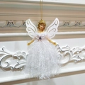 Dettaglio dell'angelo in pizzo bianco con ali dorate per decorazione albero di Natale - Bianco