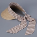 Detail of raffia sun visor featuring a large gingham bow and long ribbon straps - M(56-58cm) / Coffee Plaid