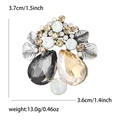 Dettaglio delle dimensioni della spilla a fiore vintage con altezza 3,7 cm e peso netto - Base Argento Champagne + Grigio