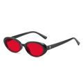 Retro oval sunglasses with black frames and vibrant red lenses in 45-degree view - Black Frame With Red Film C22