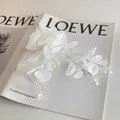 Artificial white eucalyptus branch for Halloween home decor with realistic heart-shaped leaves - White