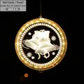 3D acrylic Christmas LED bell hanging light with bow and snowflake patterns in warm yellow - 16CM Bell Style