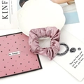 Dusty rose satin scrunchie with silk texture shown on a decorative white plate - 4#-Pink