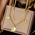 Double-layered gold stainless steel necklace with green enamel elephant pendants - Gold - Layered Elephant Necklace