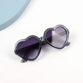 Detail of heart-shaped sunglasses with silver glitter frames and gradient lenses - Black and Gray