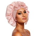 Detail of soft pink satin sleep bonnet showing glossy fabric texture and decorative bow - Medium Single Layer Ribbon / Coral Pink