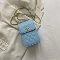 Light blue quilted crossbody phone bag with gold chain strap and turn-lock closure - Blue