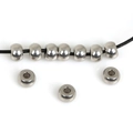 Flat round stainless steel spacer beads for DIY jewelry making on white background - 8x5mm Spacer Bead (3mm Hole) (20 Pieces/Pack)