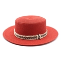 Detailed top view of red straw sun hat with black and white gingham fringe band - M (56-58cm) / Red