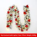 270cm flocked Christmas garland with red flowers, pine cones and LED lights on white background - 240 Tips Red Garland With LED Lights
