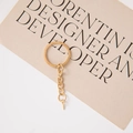 Golden alloy keychain components set including a flat ring, short chain, and screw eye pin - Gold Flat Ring 4-Link Chain + Screw Eye Pin