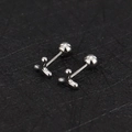 Detailed macro view of silver 16G stainless steel stud with screw-on ball back design - Y-Shape/Chevron / Steel