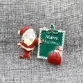 Festive Santa Claus brooch with Merry Christmas sign and gift bag on grey fabric - Cute Santa Face Dangle