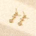 Eleganti orecchini a perno in argento S925 dorato con tre quadrifogli in zircone lucido - Argento 925 / Oro