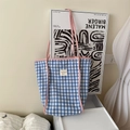 Blue and white plaid canvas tote bag with pink straps and brand label detail - Blue Plaid