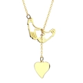 Golden necklace with creative handshake pendant and hanging heart tag on white background - Handshake and Heart