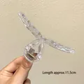 Transparente 11,5 cm große Haarklammer im minimalistischen Twist-Design für Damen - Transparent Kreuzform