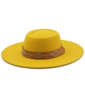 Detail of the yellow wool fedora hat featuring a brown leather band with silver rivets - M / Yellow