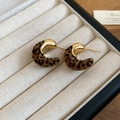 Detail view of 18K gold plated C-shaped earrings with brown leopard print flocking texture - 49# Silver Needle - Gold - Leopard - C-Shape Flocking