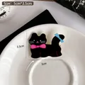 Cute black cat hair clip with pink bow and blue accents, 5cm size variant for styling - Glossy Black Cat