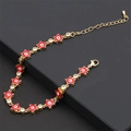 Bracciale a stella dorato con occhi del male in smalto rosso e zirconi da donna - Rosso